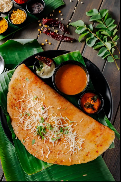 Authentic South Indian Masala Dosa served at Moms Inn Dosa Restaurant in Surat